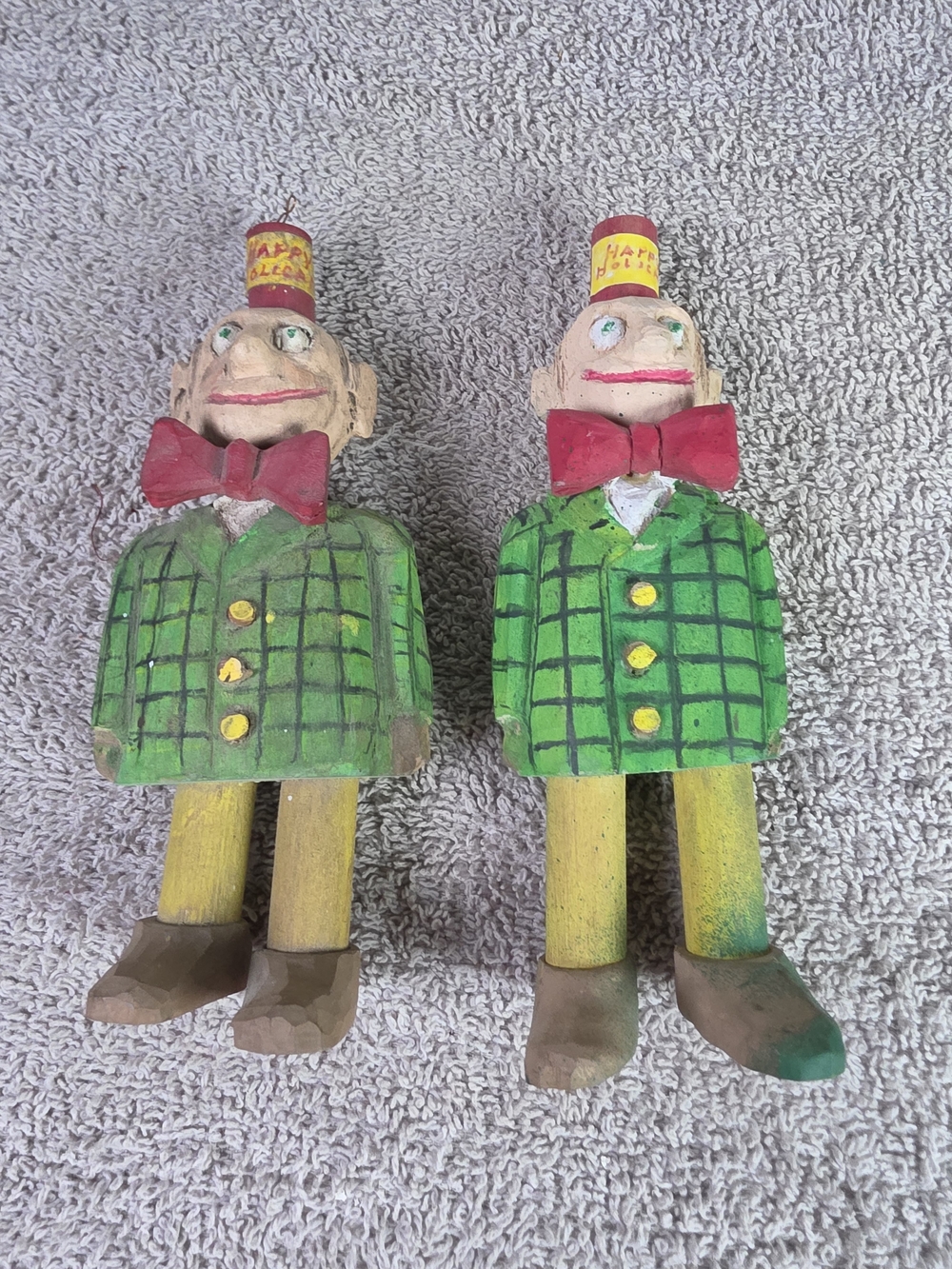 Handcrafted Folk Art Green Wooden Figurine Pair with Red Bow Ties